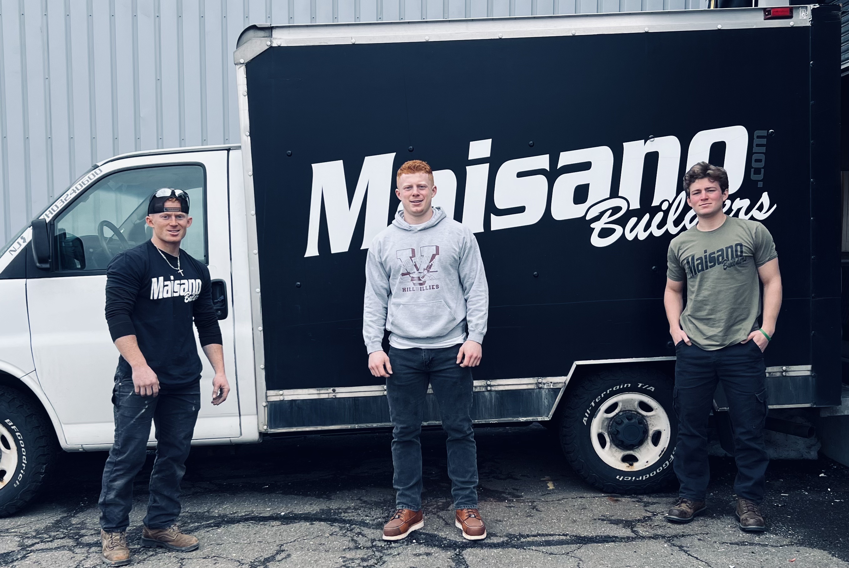 The Maisano Builders team standing in front of their work truck today